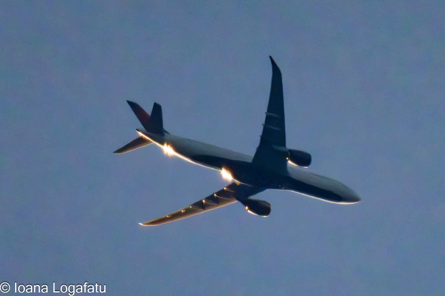 Skyward journey of a soaring aircraft above clouds